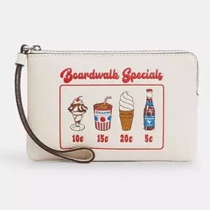 NWT Coach Corner Zip Wristlet With Boardwalk Graphic